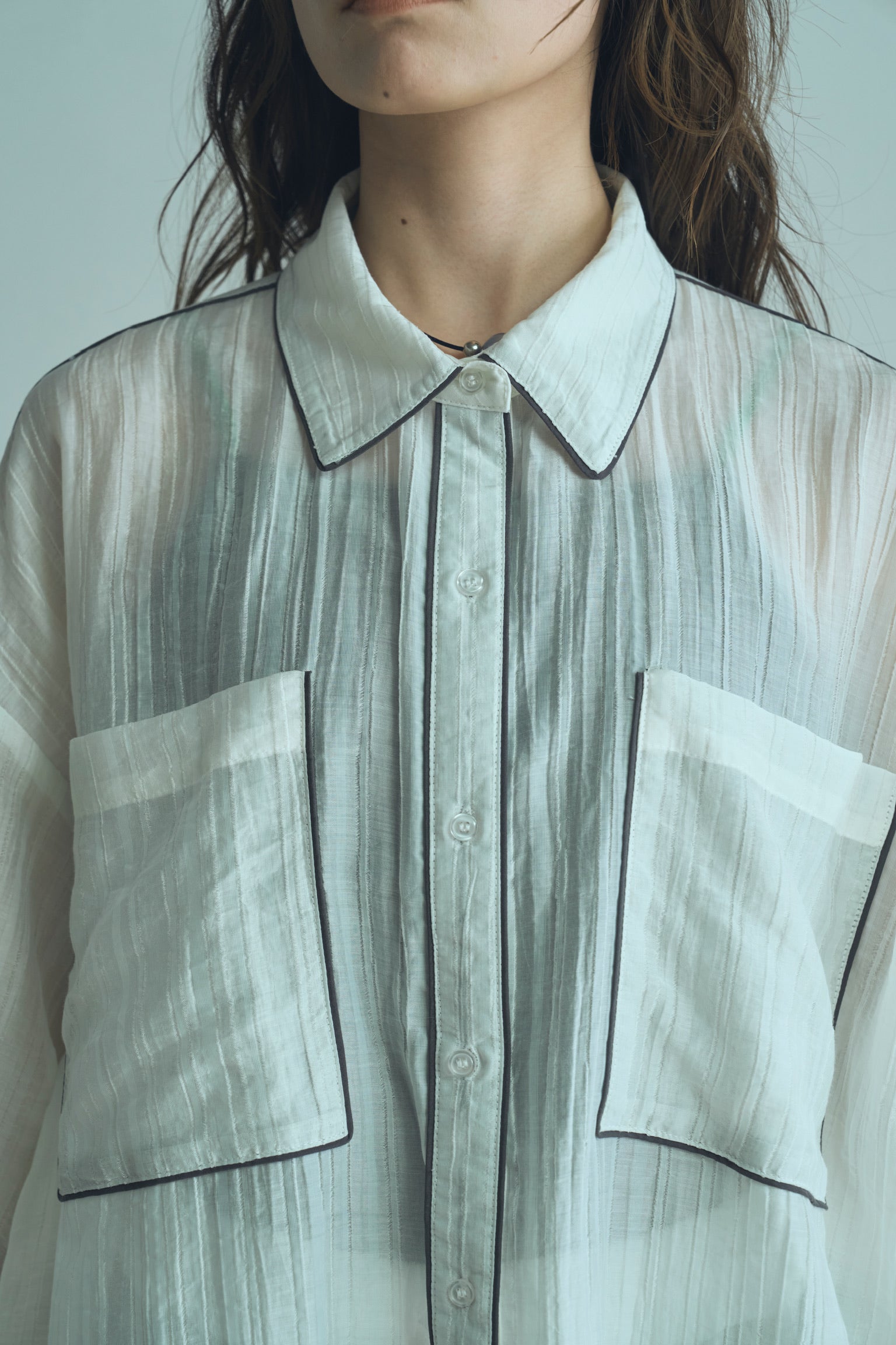 piping over shirt